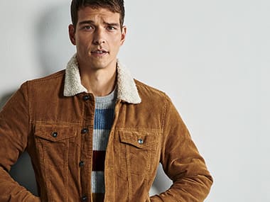 Man wearing tan brown cord jacket