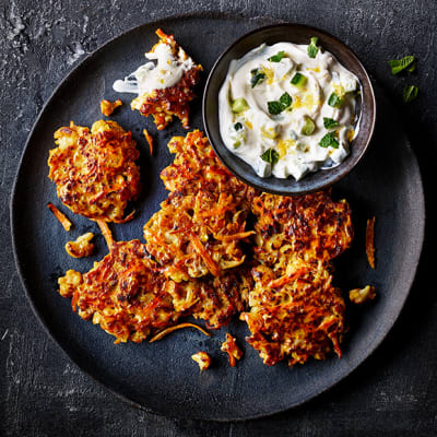 Roasted cauliflower and cumin fritter with cucumber and yogurt dip