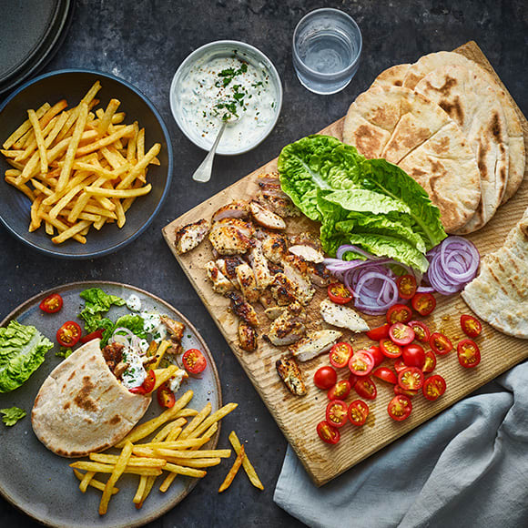 Springtime chicken souvlaki-style pittas