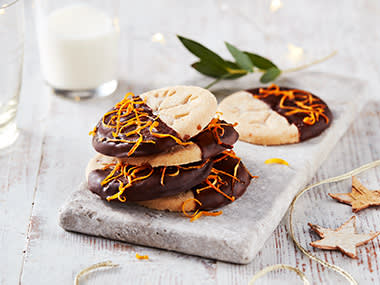Shortbread dipped in chocolate and orange zest