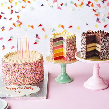 Three brightly coloured celebratory cakes