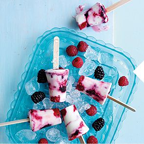 An iced tray filled with berry swirled lollies