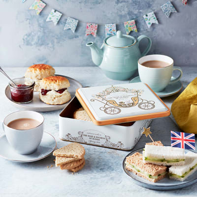 A royal baby celebratory tea with scones, cucumber sandwiches, Earl Grey tea and shortbread