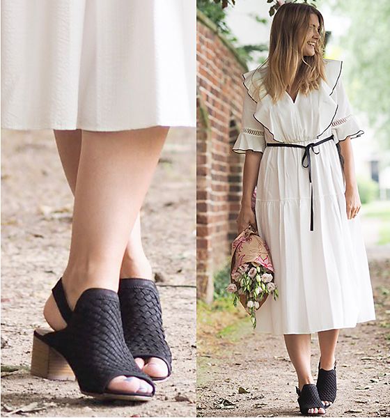 Cara Sutherland from Within These Walls wearing a white dress and black leather weave slingback sandals