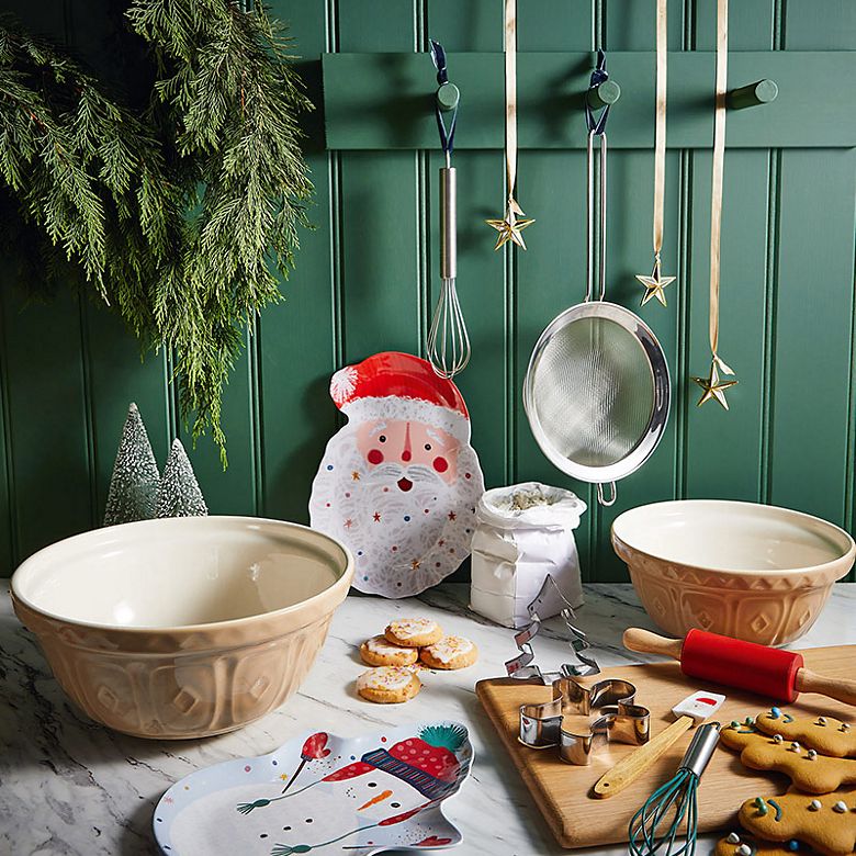 Christmas baking kit including cookie cutters, whisk and rolling pin. Shop the kit.