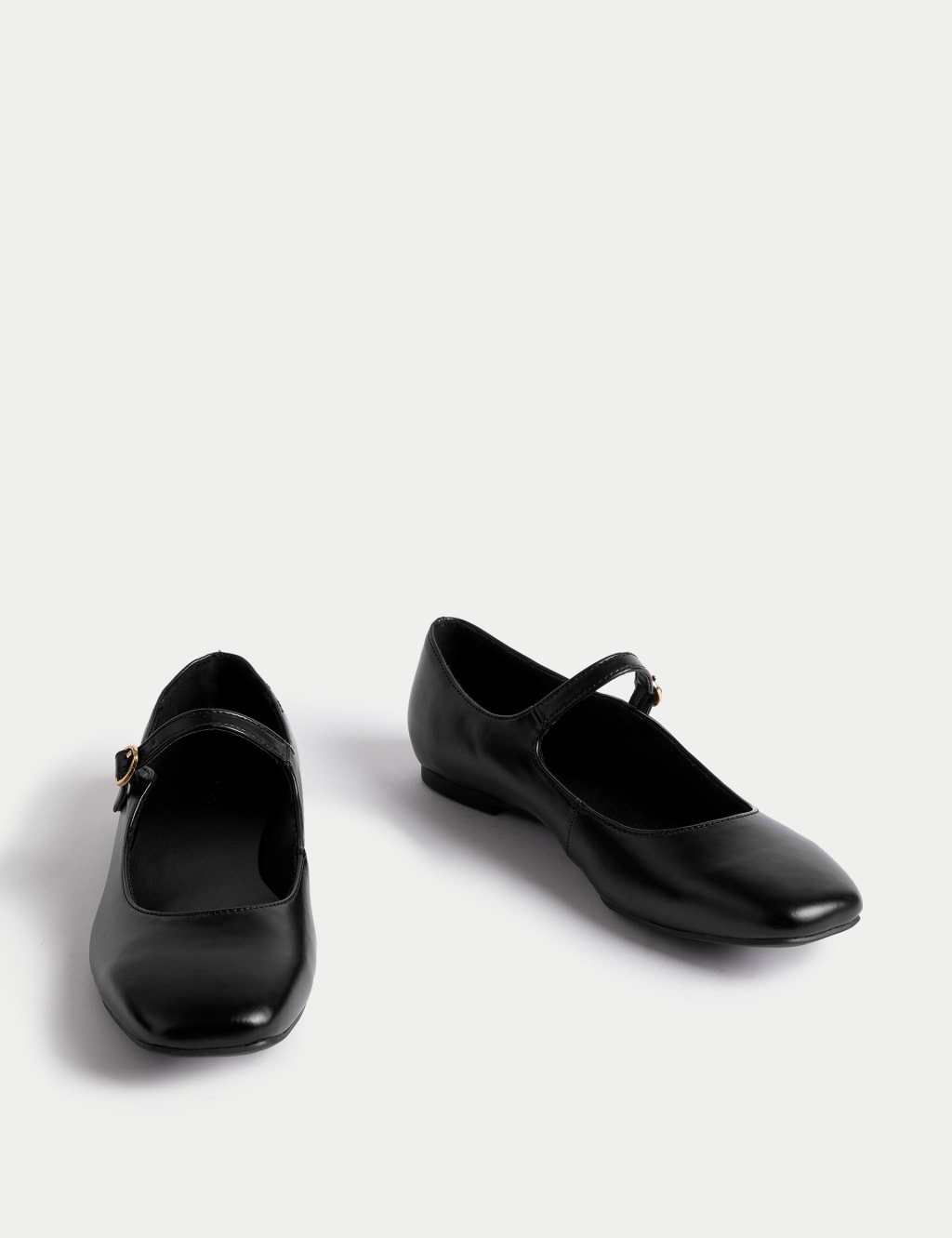 Black ballet pumps with shop strap