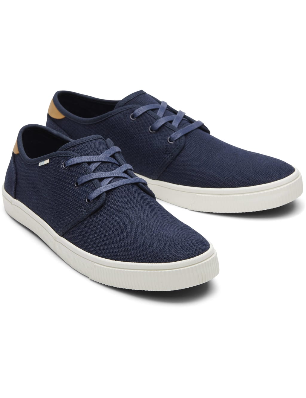 Toms lace sales up trainers