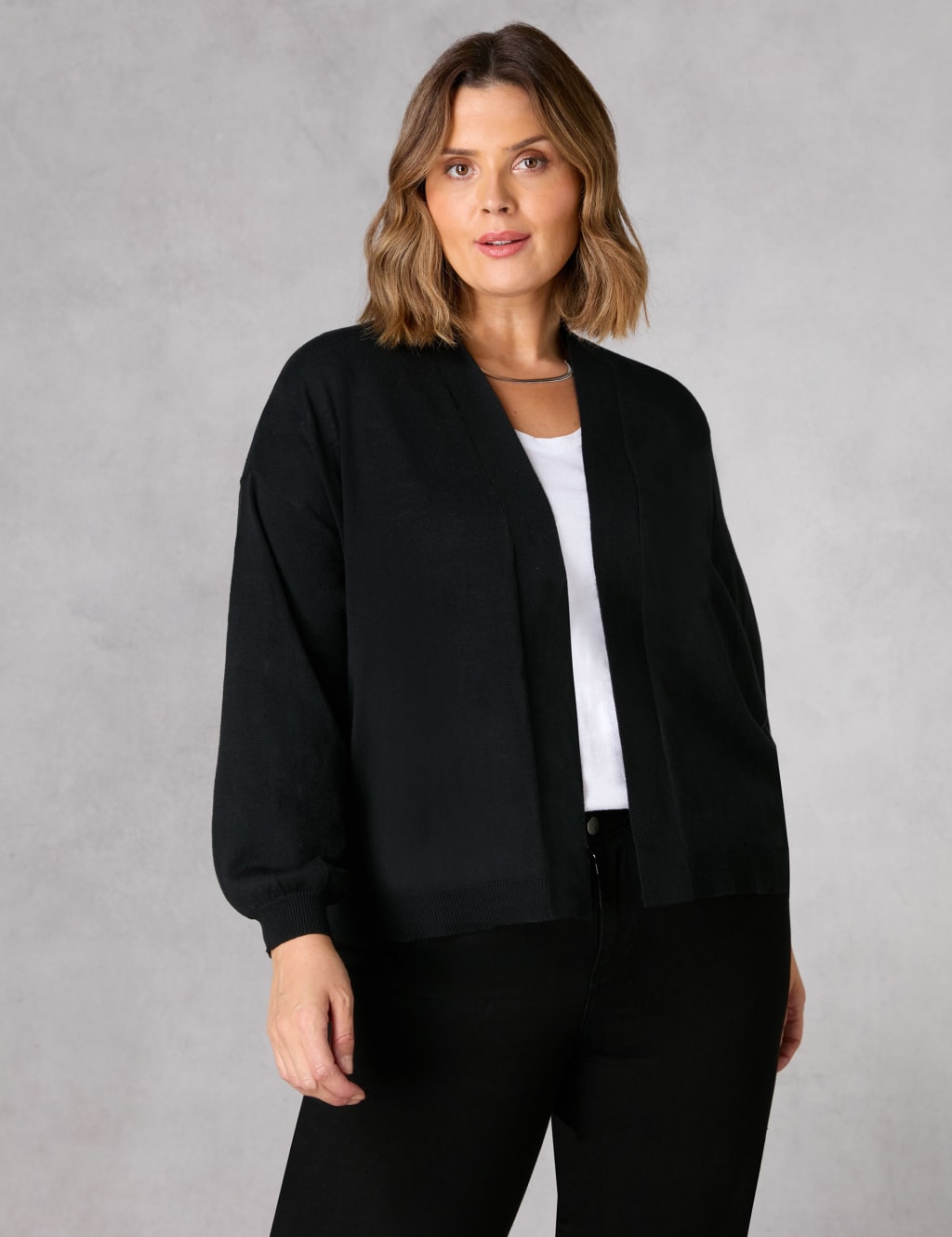 Ladies black edge to edge cardigan top