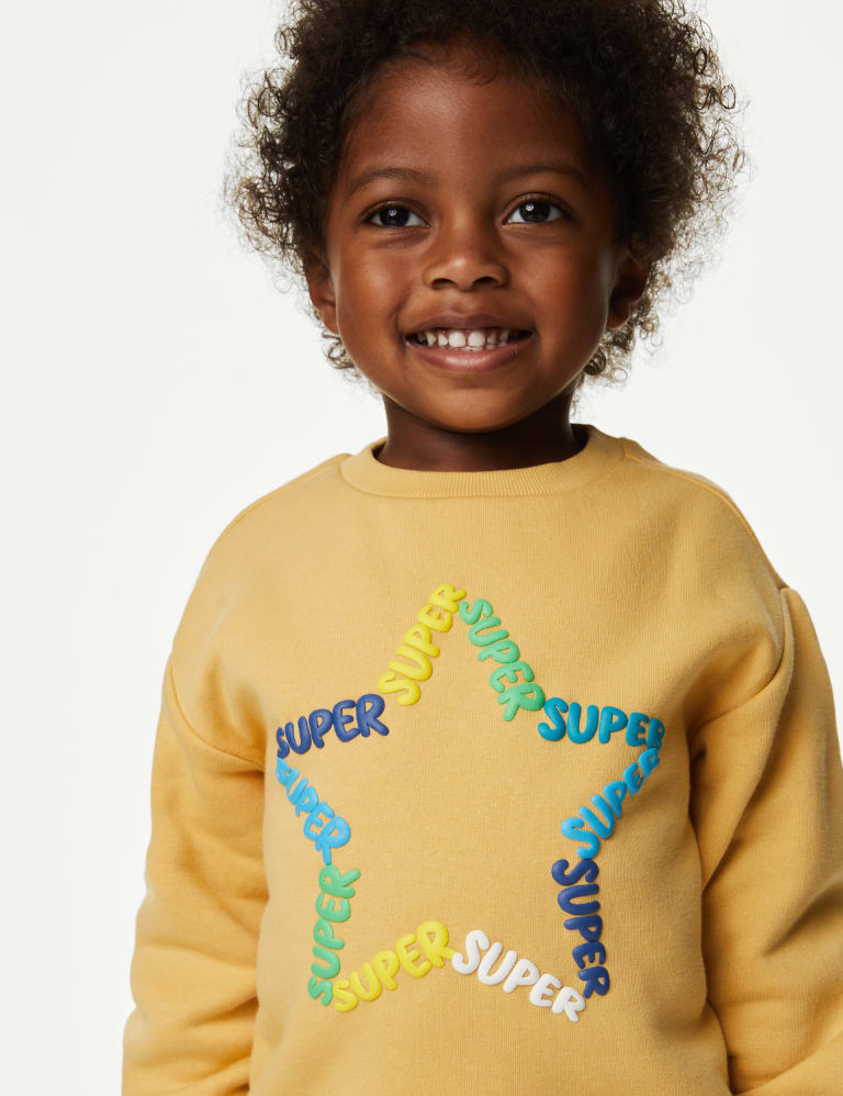 Yellow slogan jumper deals