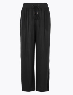 ASOS DESIGN beach harem trousers in black crinkle