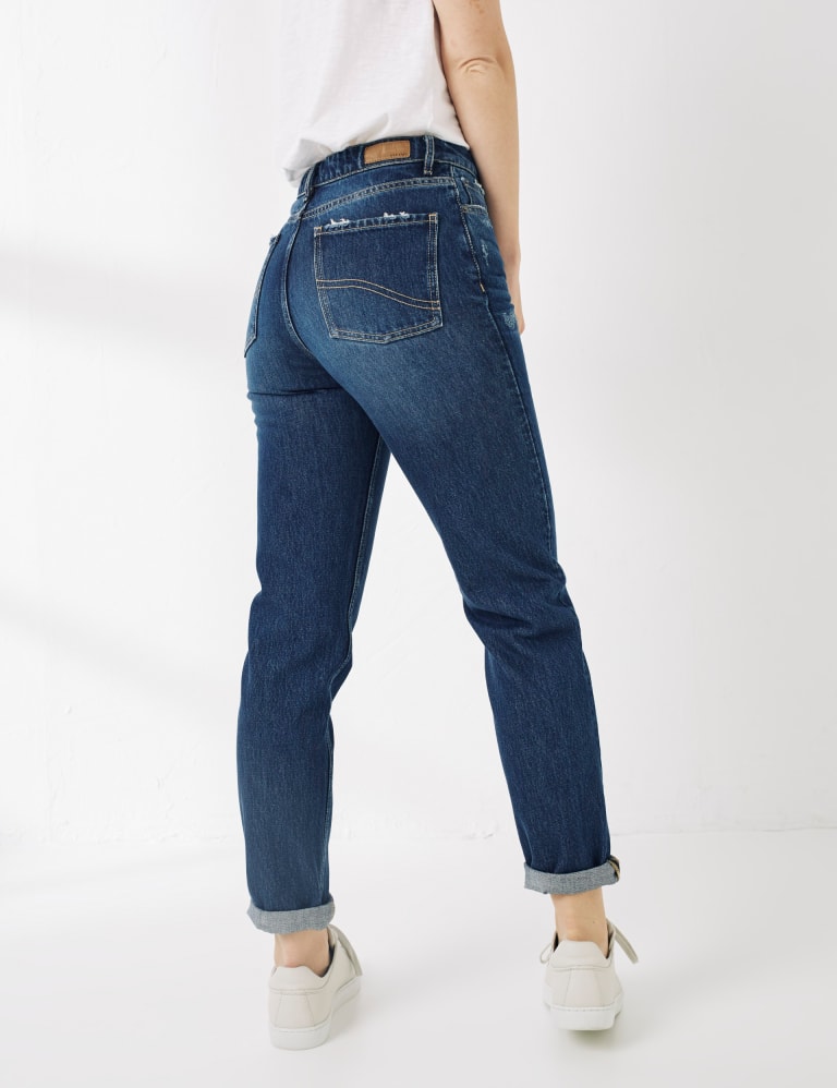 Distressed straight jeans shop