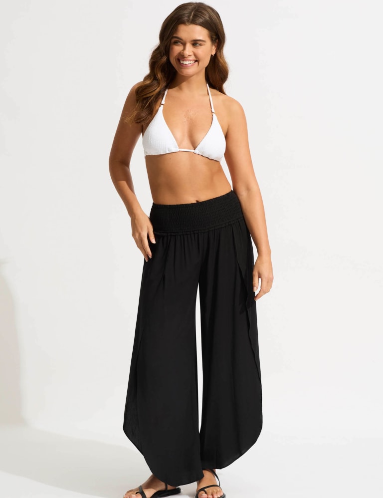 FREE PEOPLE MVOEMENT BLISSED OUT WIDE LEG PANTS - CACTUS FLOWER