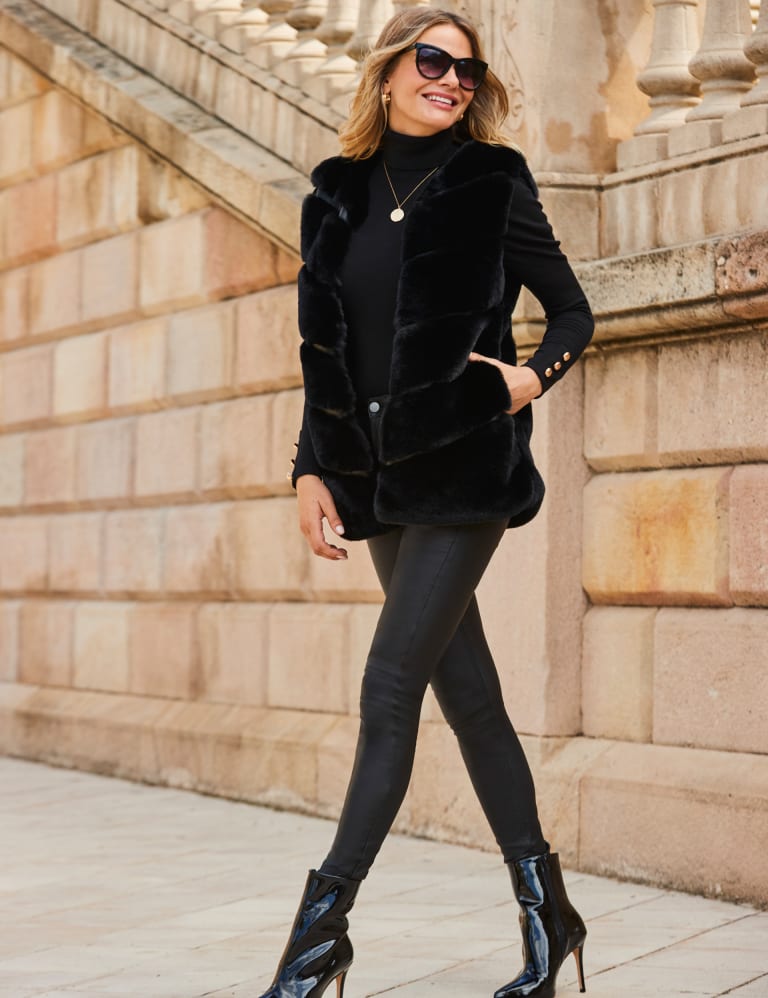 Buy Sosandar Black Faux Fur Leather Puff Sleeve Jacket from the