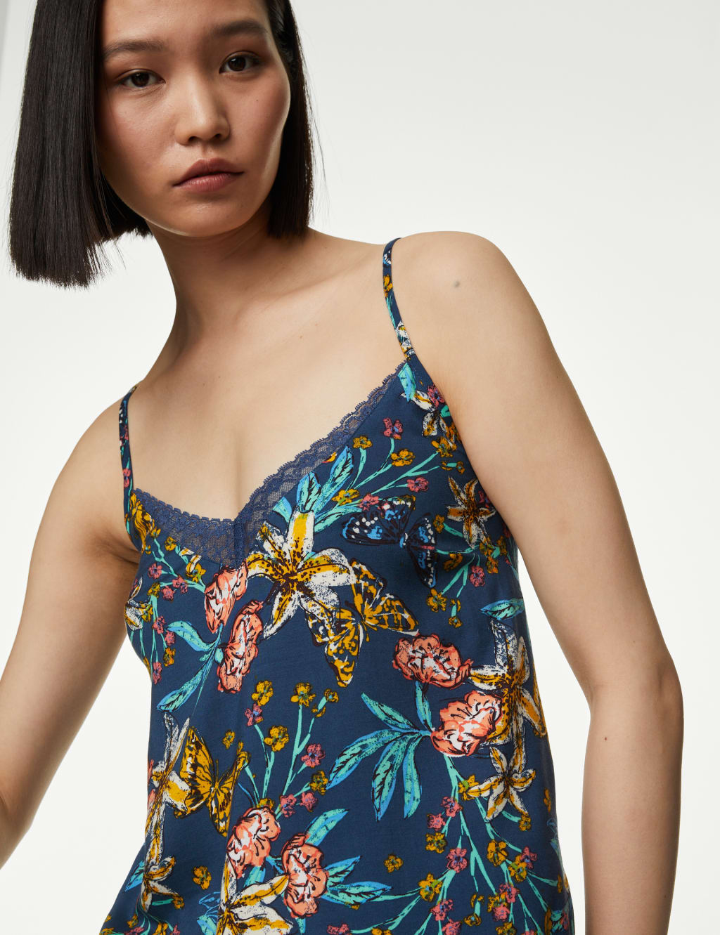 Black floral cami top deals