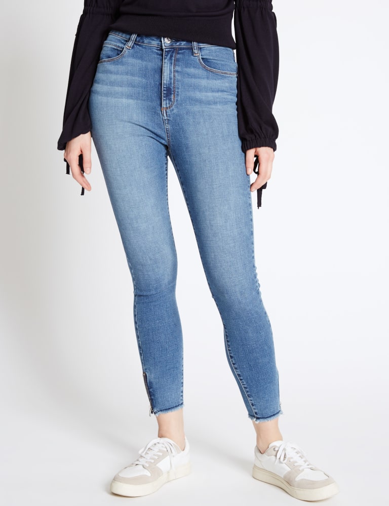 Skinny frayed ankle jeans deals