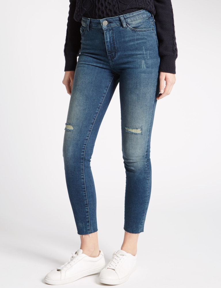 Uneven frayed hem jeans clearance