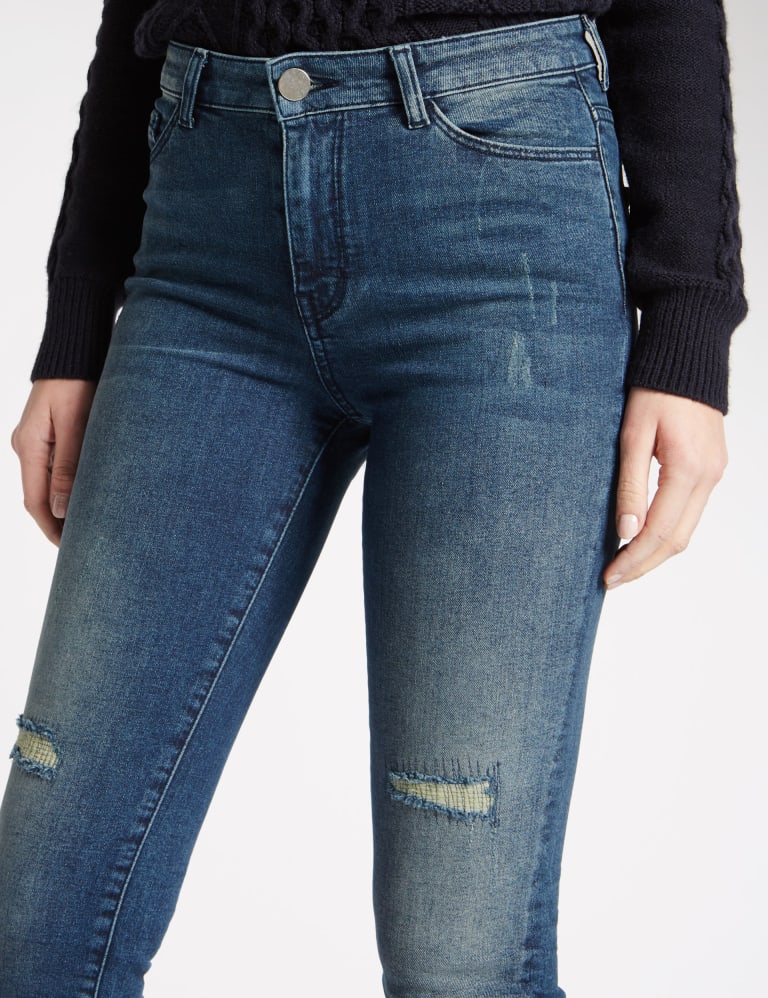 Uneven frayed hem jeans 2025