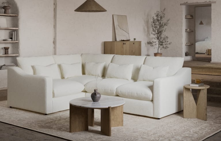 Couch that 2025 sits on ground