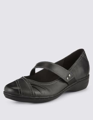 black leather flat dolly shoes
