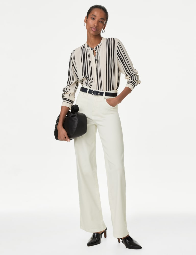 High waist wide leg pants with gold button accents in white