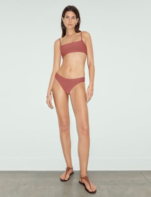 2024 swimwear trends - Sienna Miller x M&S terracotta-toned bikini Crafted from premium fabric in a warm terracotta shade with a square neck and no underwire and hipster bikini bottoms. 