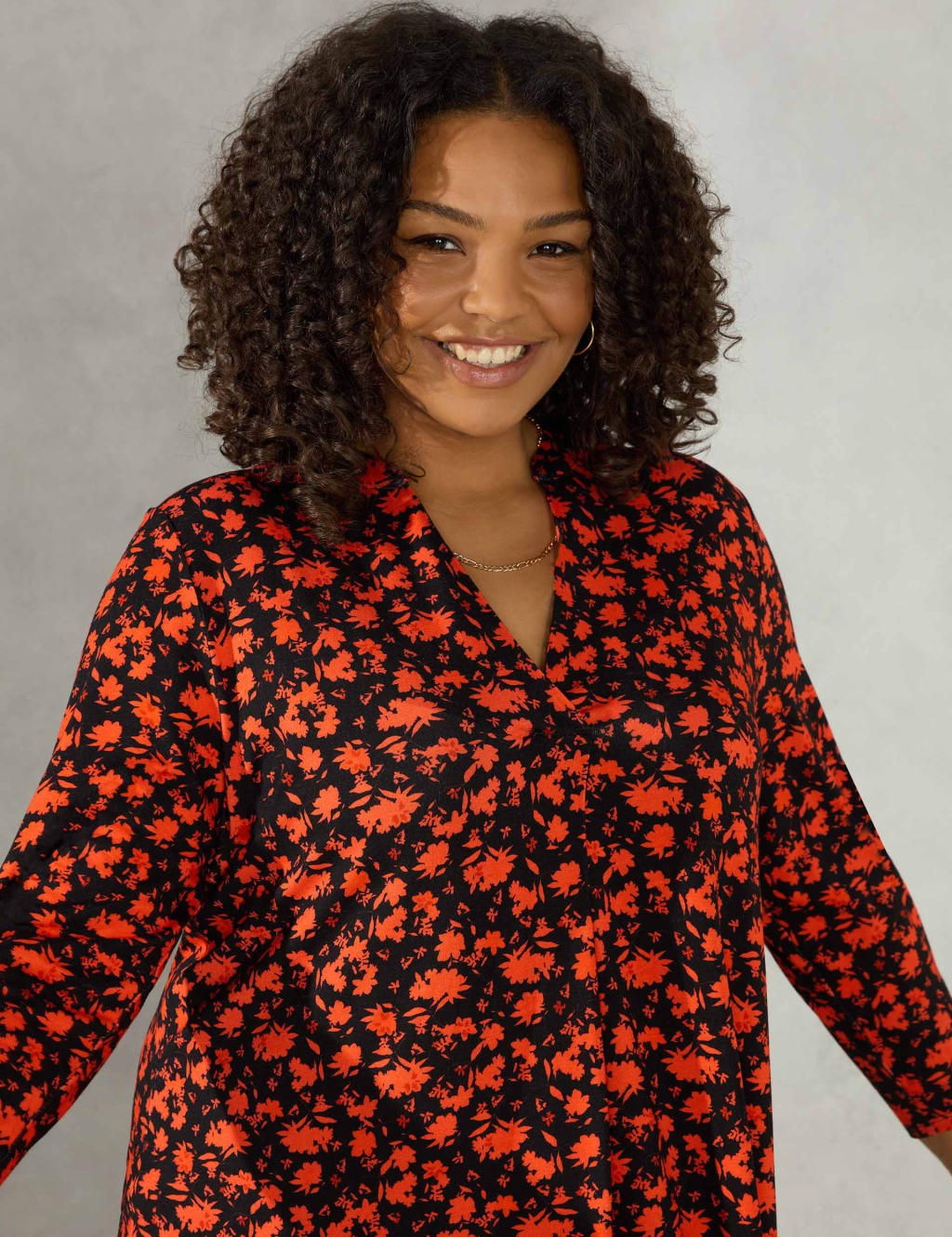 Black floral shop tunic