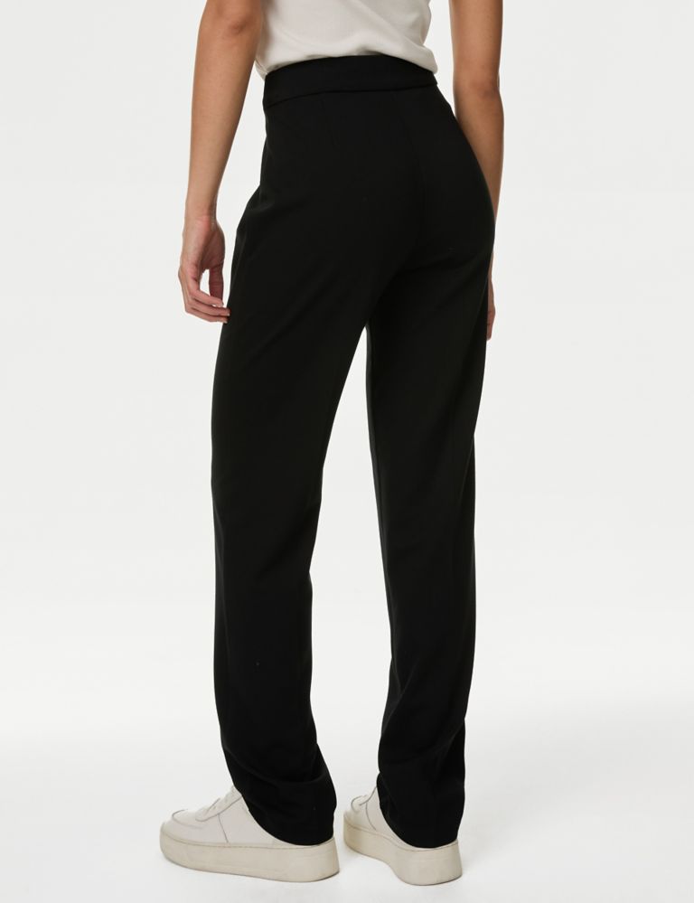 Black elasticated waist trousers for elderly ladies. half