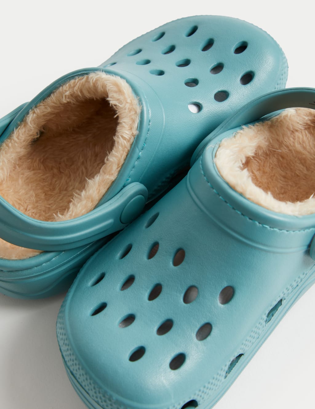 Ice blue fuzzy crocs deals