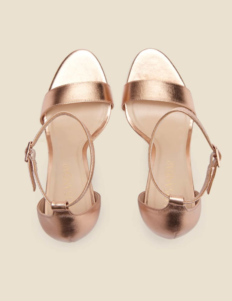 Gold pointed toe heels with ankle strap top