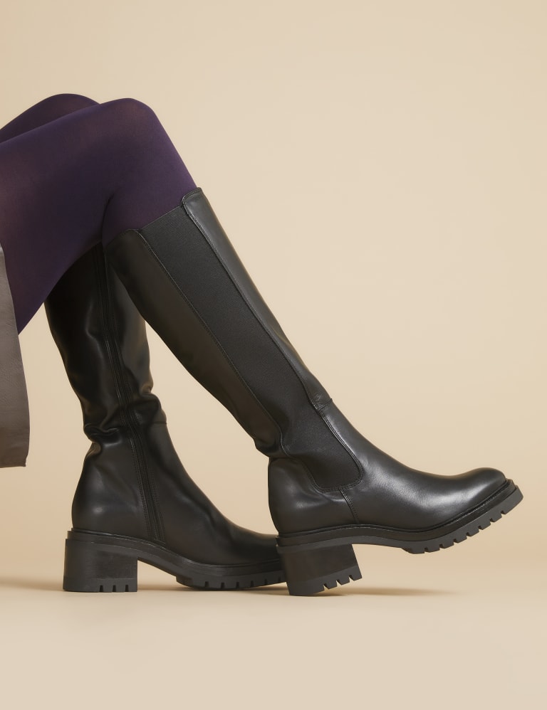 Black leather knee high low heel boots hot sale