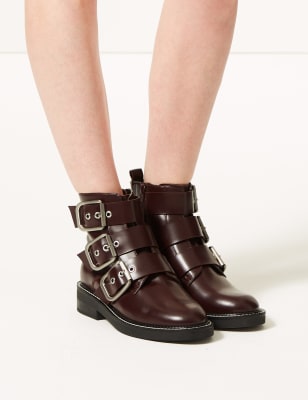 buckle wedge boots