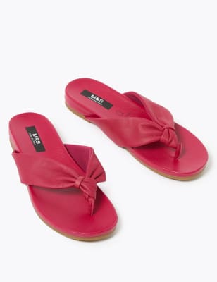 pink leather flip flops