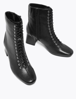 black boots with white laces
