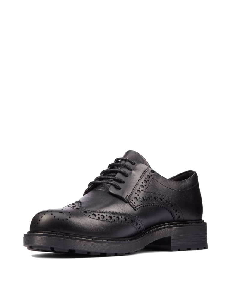 Clarks black hotsell and white brogues