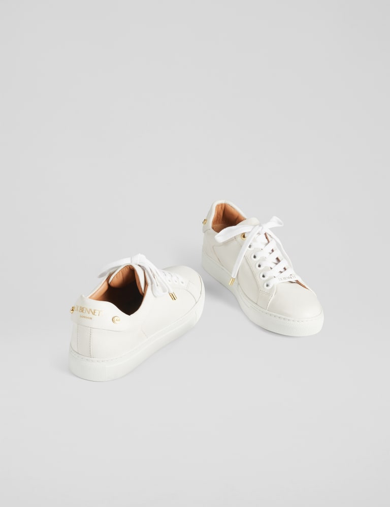 Curly lace up trainers discount