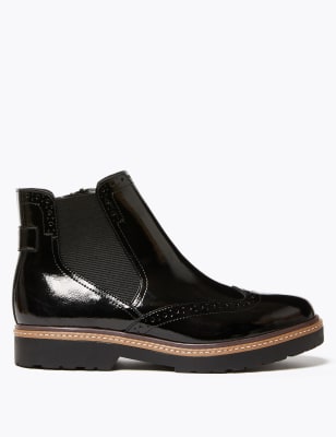 black patent brogue boots