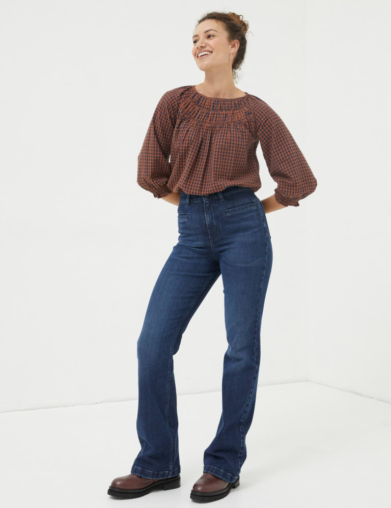 Mid rise flared jeans top