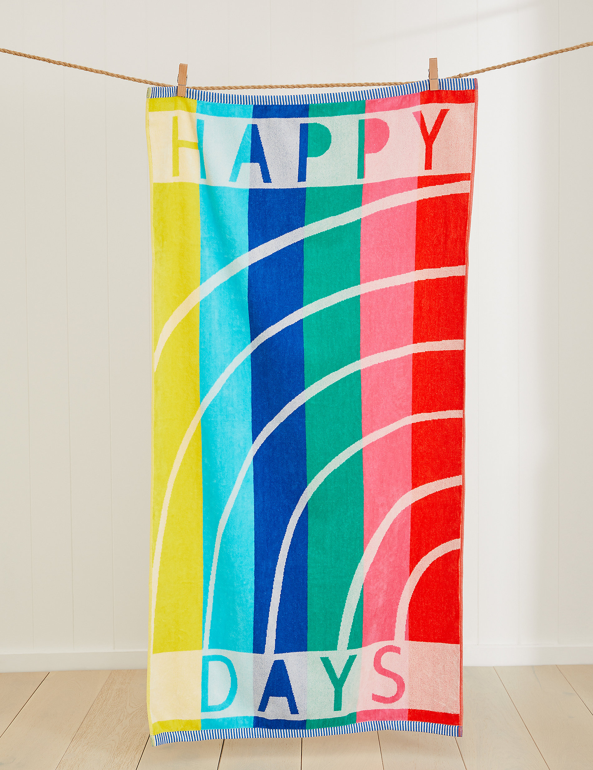 מגבת חוף מכותנה טהורה עם כיתוב Happy Days