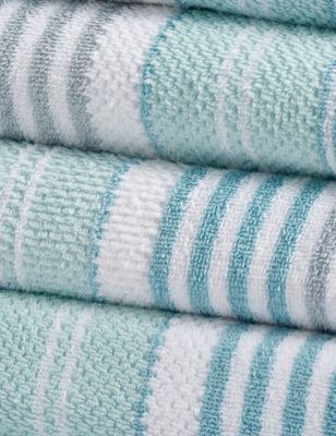 green patterned bath towels