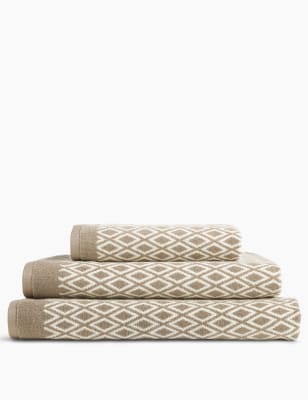 Serviette en coton &agrave; motif losanges fa&ccedil;on jacquard