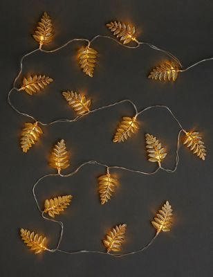 Guirlande lumineuse ornée de feuilles dorées