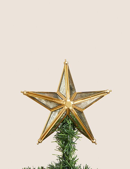 Kerstboompiek in de vorm van een gouden ster