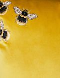 Fluwelen kussen met geborduurd bijenmotief