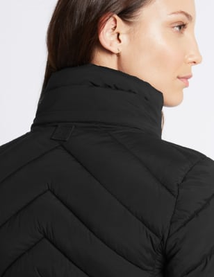 Coat with store detachable hood