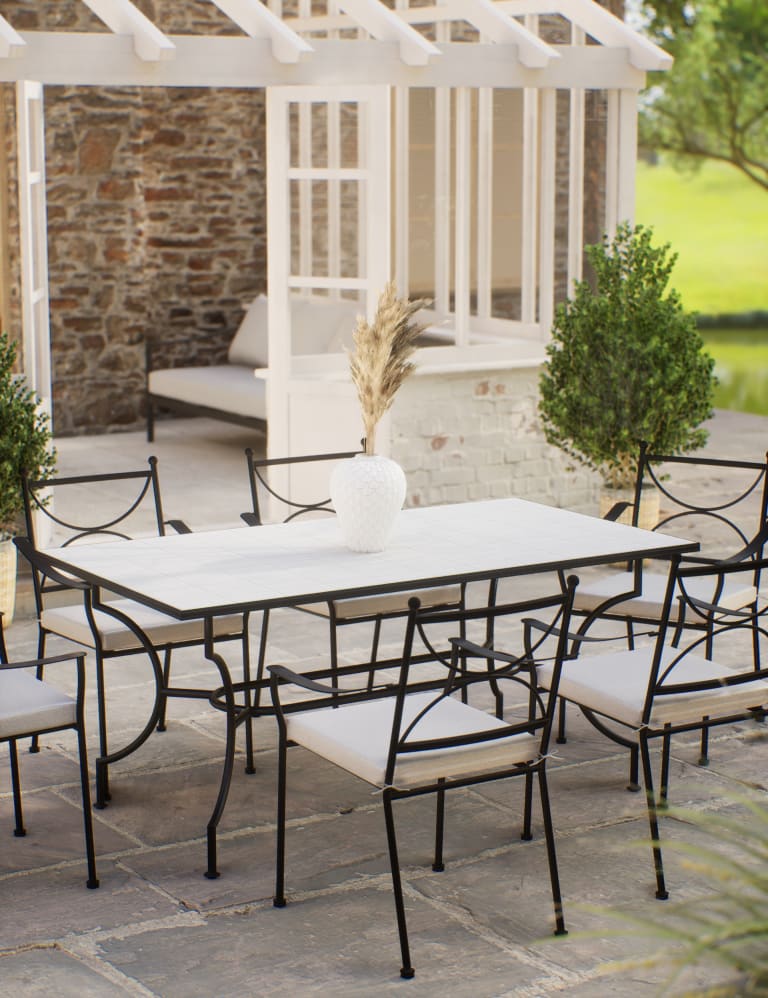 Rod iron dining clearance table and chairs
