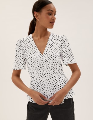 Spotty store peplum top