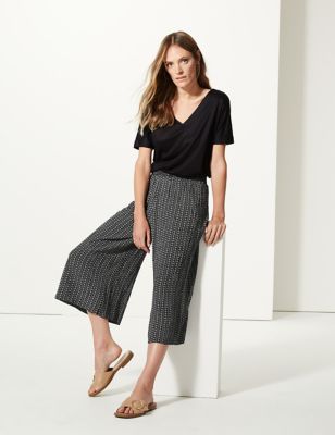 Cropped flared trousers