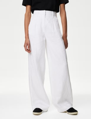 These M&S white pure linen trousers are perfect for warmer days. Designed in a stylish wide-leg fit, with a flattering high waistband. They fasten securely with a smart hook and bar, and feature belt loops for easy accessorising. M&S Collection: easy-to-wear wardrobe staples that combine classic and contemporary styles.