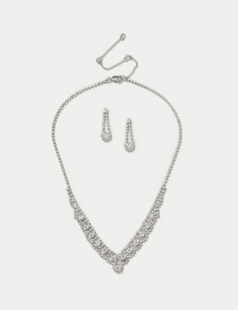 Silver necklace and matching earrings sale