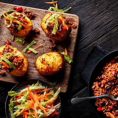 Beef and bean chilli with cheesy jackets